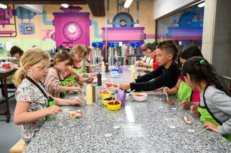 Children making chocolate lollipops